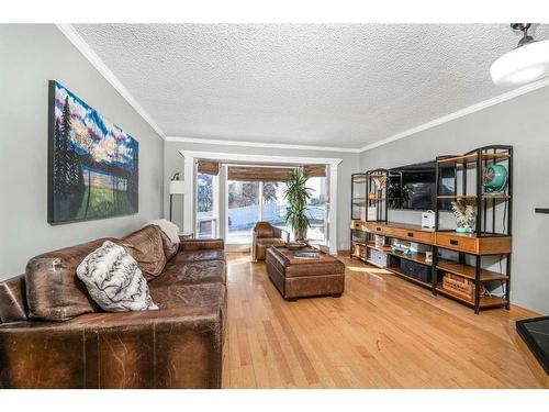 68 Stradwick Rise Sw, Calgary, AB - Indoor Photo Showing Living Room