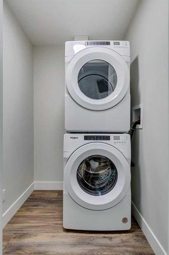 217-8355 19 Avenue Sw, Calgary, AB - Indoor Photo Showing Laundry Room