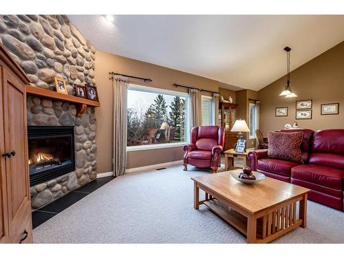 578128 8 Street East, Rural Foothills County, AB - Indoor Photo Showing Living Room With Fireplace