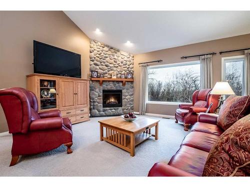 578128 8 Street East, Rural Foothills County, AB - Indoor Photo Showing Living Room With Fireplace