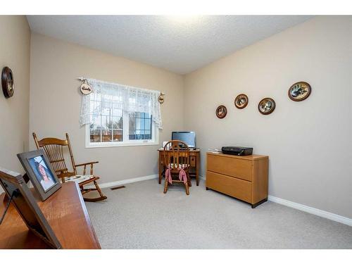 578128 8 Street East, Rural Foothills County, AB - Indoor Photo Showing Bedroom