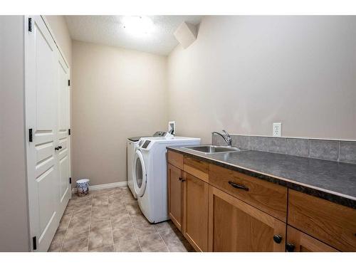 578128 8 Street East, Rural Foothills County, AB - Indoor Photo Showing Laundry Room