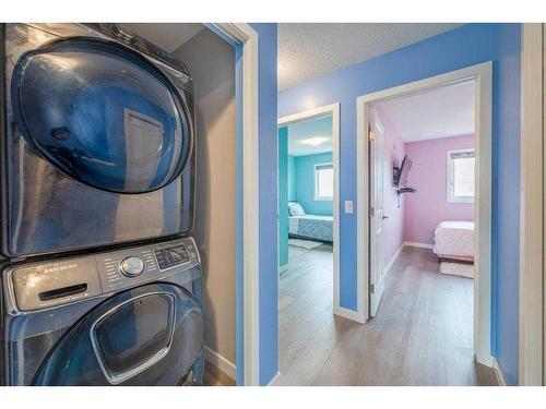15 Corner Meadows Villas Ne, Calgary, AB - Indoor Photo Showing Laundry Room