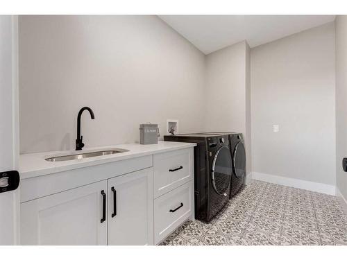 116 Centre Avenue Ne, Airdrie, AB - Indoor Photo Showing Laundry Room