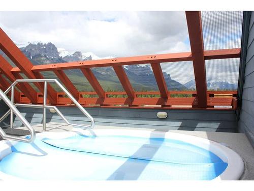 308-1160 Railway Avenue, Canmore, AB - Outdoor With In Ground Pool