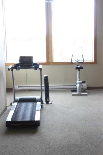 308-1160 Railway Avenue, Canmore, AB - Indoor Photo Showing Gym Room
