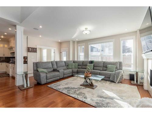 265 Kinniburgh Boulevard, Chestermere, AB - Indoor Photo Showing Living Room