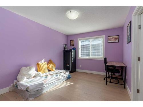 265 Kinniburgh Boulevard, Chestermere, AB - Indoor Photo Showing Bedroom