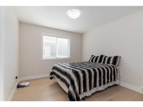 265 Kinniburgh Boulevard, Chestermere, AB - Indoor Photo Showing Bedroom