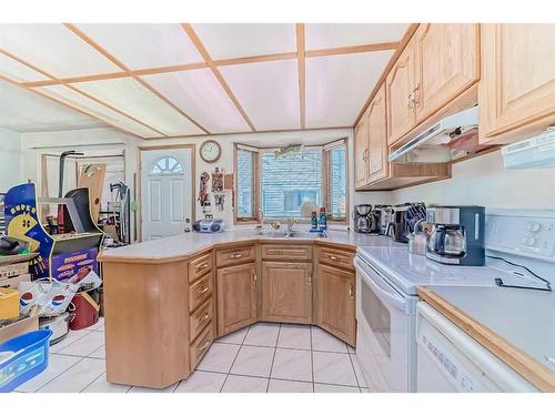 4719 Greenview Drive Ne, Calgary, AB - Indoor Photo Showing Kitchen With Double Sink