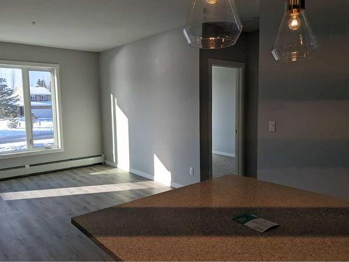 208-200 Shawnee Square Sw, Calgary, AB - Indoor Photo Showing Other Room