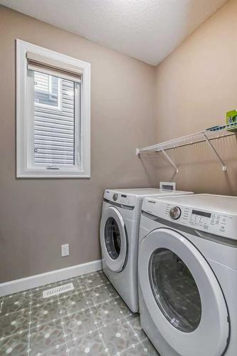 168 Carrington Close Nw, Calgary, AB - Indoor Photo Showing Laundry Room