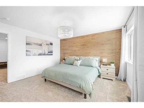 107 Saddlebred Link, Cochrane, AB - Indoor Photo Showing Bedroom