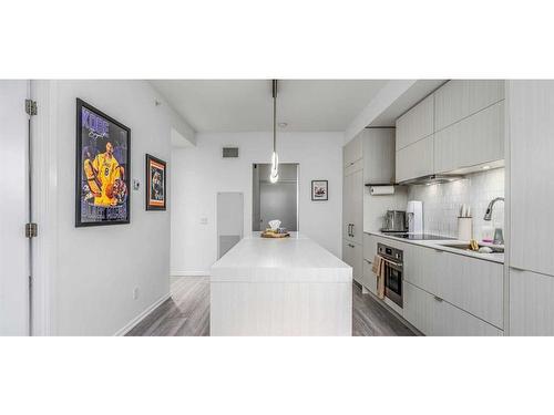 411-615 6 Avenue Se, Calgary, AB - Indoor Photo Showing Kitchen With Upgraded Kitchen