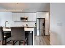 602-327 9A Street Nw, Calgary, AB  - Indoor Photo Showing Kitchen With Stainless Steel Kitchen With Upgraded Kitchen 