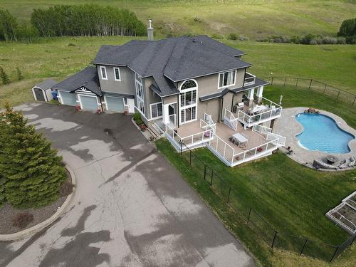 82 Campbell Drive, Rural Rocky View County, AB - Outdoor With In Ground Pool