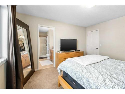 1678 New Brighton Drive Se, Calgary, AB - Indoor Photo Showing Bedroom