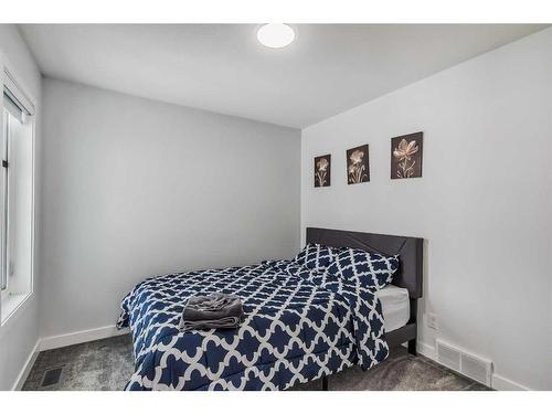 53 Belmont Villas Sw, Calgary, AB - Indoor Photo Showing Bedroom