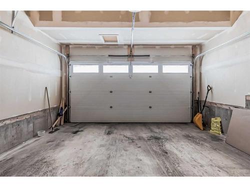 53 Belmont Villas Sw, Calgary, AB - Indoor Photo Showing Garage