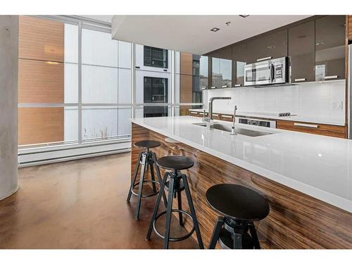 401-235 9A Street Nw, Calgary, AB - Indoor Photo Showing Kitchen With Upgraded Kitchen