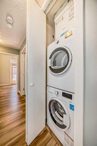 209-118 8 Street Ne, Calgary, AB - Indoor Photo Showing Laundry Room