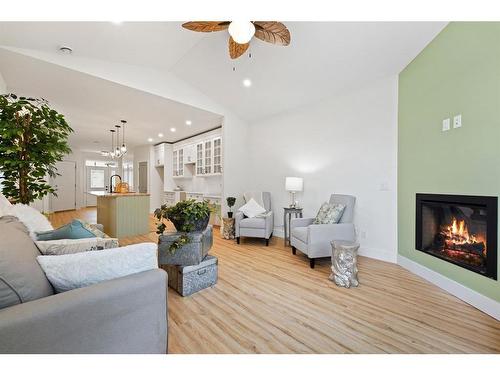 25-610 4 Avenue Sw, Sundre, AB - Indoor Photo Showing Living Room With Fireplace