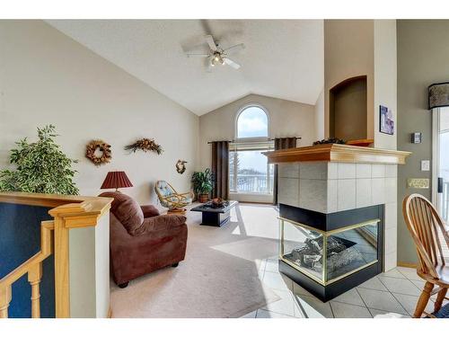2281 Sirocco Drive Sw, Calgary, AB - Indoor Photo Showing Living Room With Fireplace