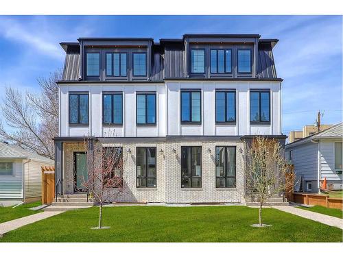 909 32 Street Nw, Calgary, AB - Outdoor With Balcony With Facade