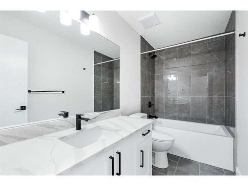 54 Hanson Drive Ne, Langdon, AB - Indoor Photo Showing Bathroom