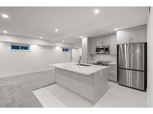 4747 26 Avenue Sw, Calgary, AB - Indoor Photo Showing Kitchen With Stainless Steel Kitchen With Double Sink