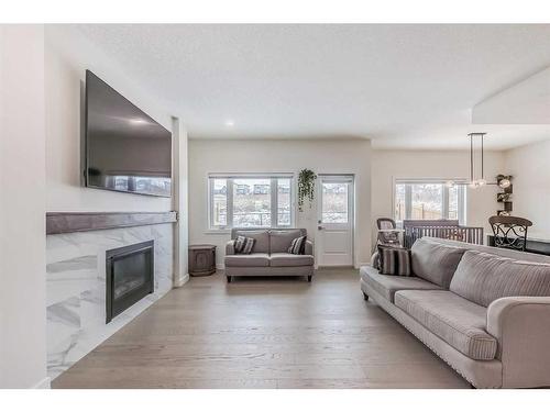 136 Lakewood Circle, Strathmore, AB - Indoor Photo Showing Living Room With Fireplace