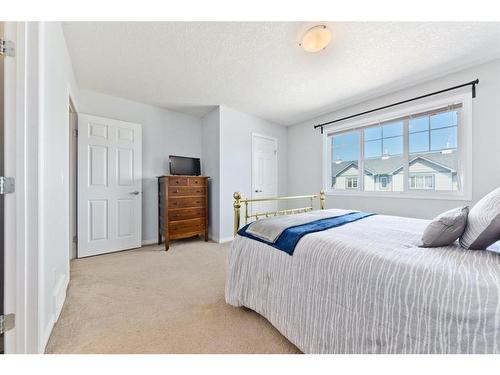 206-620 Luxstone Landing Sw, Airdrie, AB - Indoor Photo Showing Bedroom