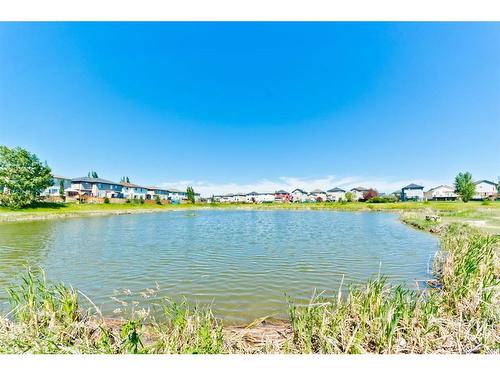 206-620 Luxstone Landing Sw, Airdrie, AB - Outdoor With Body Of Water With View