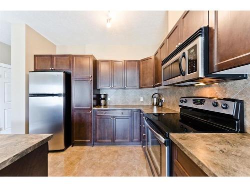 206-620 Luxstone Landing Sw, Airdrie, AB - Indoor Photo Showing Kitchen