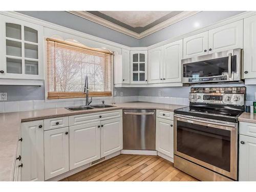 62 Kingston Drive, Red Deer, AB - Indoor Photo Showing Kitchen With Double Sink