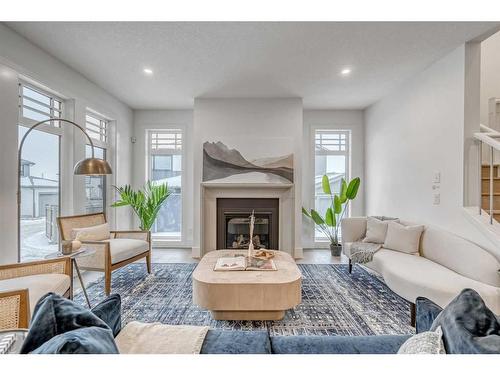 20 Treeline Lane Sw, Calgary, AB - Indoor Photo Showing Living Room With Fireplace