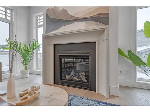 20 Treeline Lane Sw, Calgary, AB - Indoor Photo Showing Living Room With Fireplace
