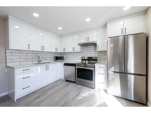 3 Whitworth Way Ne, Calgary, AB - Indoor Photo Showing Kitchen With Stainless Steel Kitchen With Upgraded Kitchen