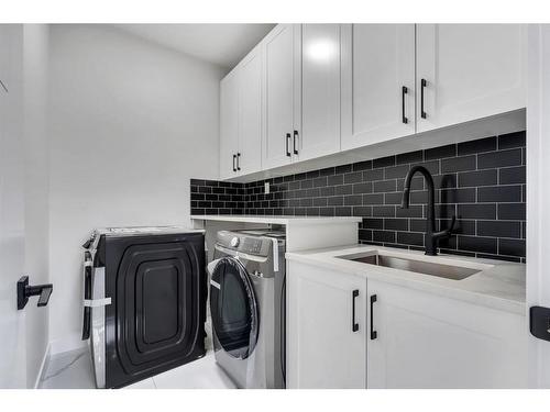 512 14 Avenue Ne, Calgary, AB - Indoor Photo Showing Laundry Room
