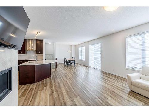 227 Carringham Road Nw, Calgary, AB - Indoor With Fireplace
