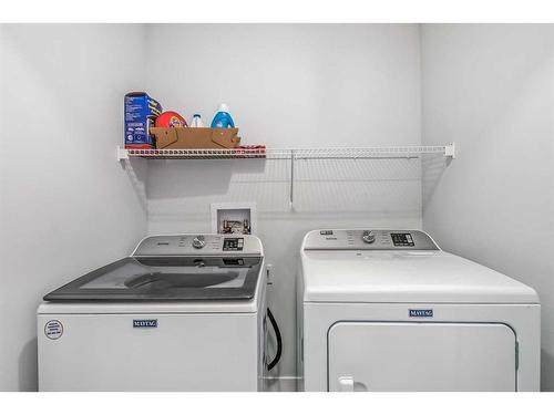 114 Waterford Road, Chestermere, AB - Indoor Photo Showing Laundry Room