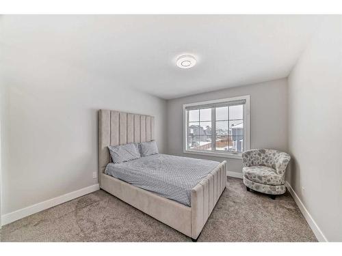 150 Sandpiper Park, Chestermere, AB - Indoor Photo Showing Bedroom