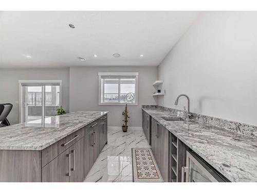 150 Sandpiper Park, Chestermere, AB - Indoor Photo Showing Kitchen With Upgraded Kitchen