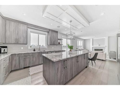 150 Sandpiper Park, Chestermere, AB - Indoor Photo Showing Kitchen With Upgraded Kitchen