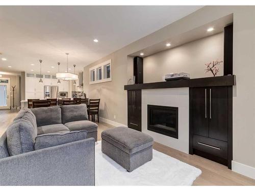 2832 42 Street Sw, Calgary, AB - Indoor Photo Showing Living Room With Fireplace