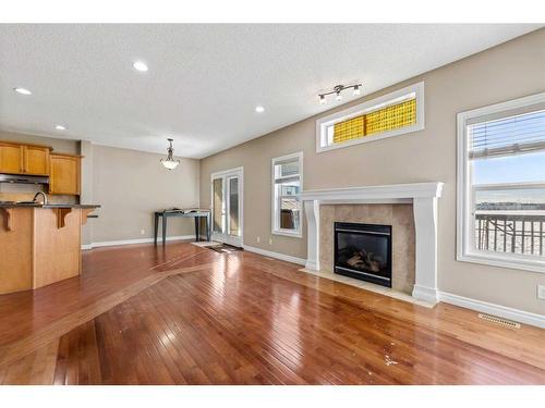 36 Saddleland Drive Ne, Calgary, AB - Indoor Photo Showing Living Room With Fireplace