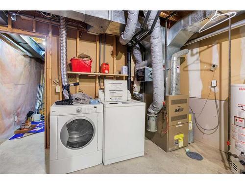 1-642 Mcdougall Road Ne, Calgary, AB - Indoor Photo Showing Laundry Room