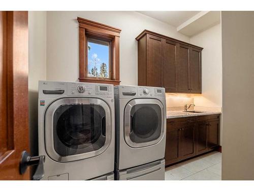 207 Hawk'S Landing Rise, Priddis Greens, AB - Indoor Photo Showing Laundry Room