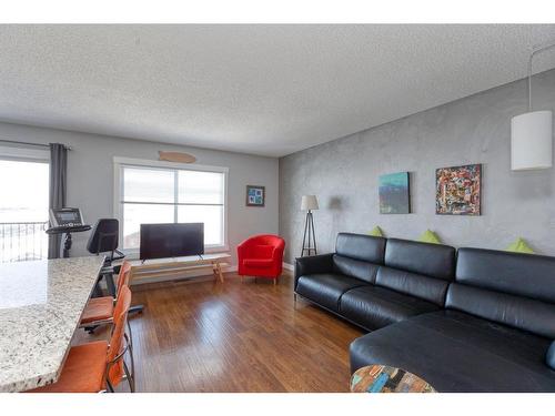 191 Sunrise View, Cochrane, AB - Indoor Photo Showing Living Room