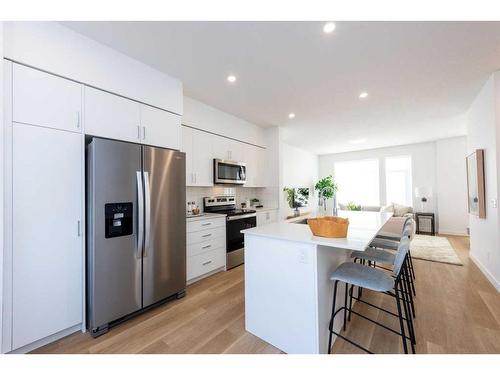 8533 19 Avenue Se, Calgary, AB - Indoor Photo Showing Kitchen With Stainless Steel Kitchen With Upgraded Kitchen